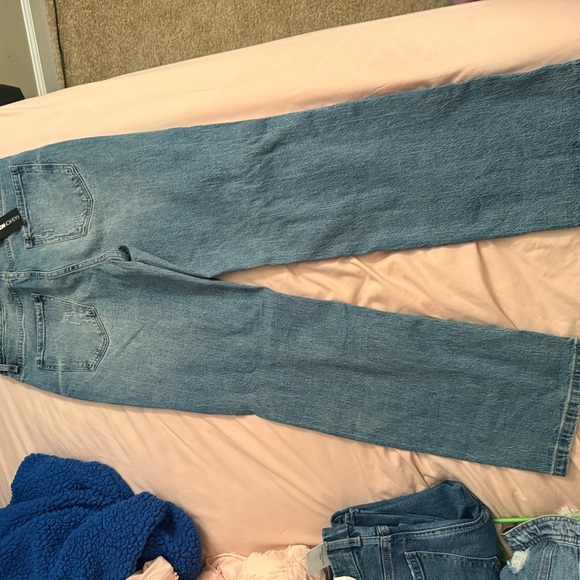 Fashion Nova Light Blue Distressed Flare Jeans - Picture 2 of 3